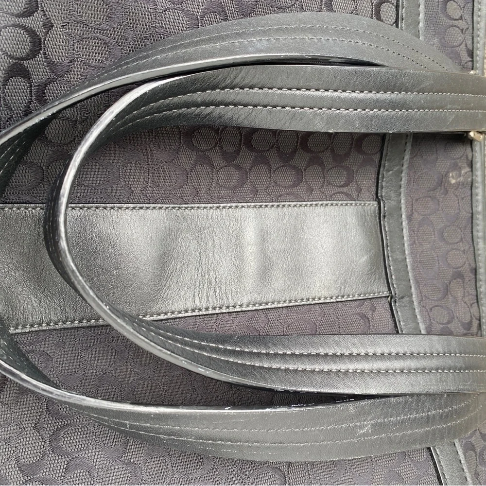 Coach Black Baby Bag with Textured Material and Sturdy Handles signature